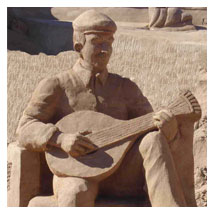 guitarrista português, componente da cena retratada na escultura  "O FADO"